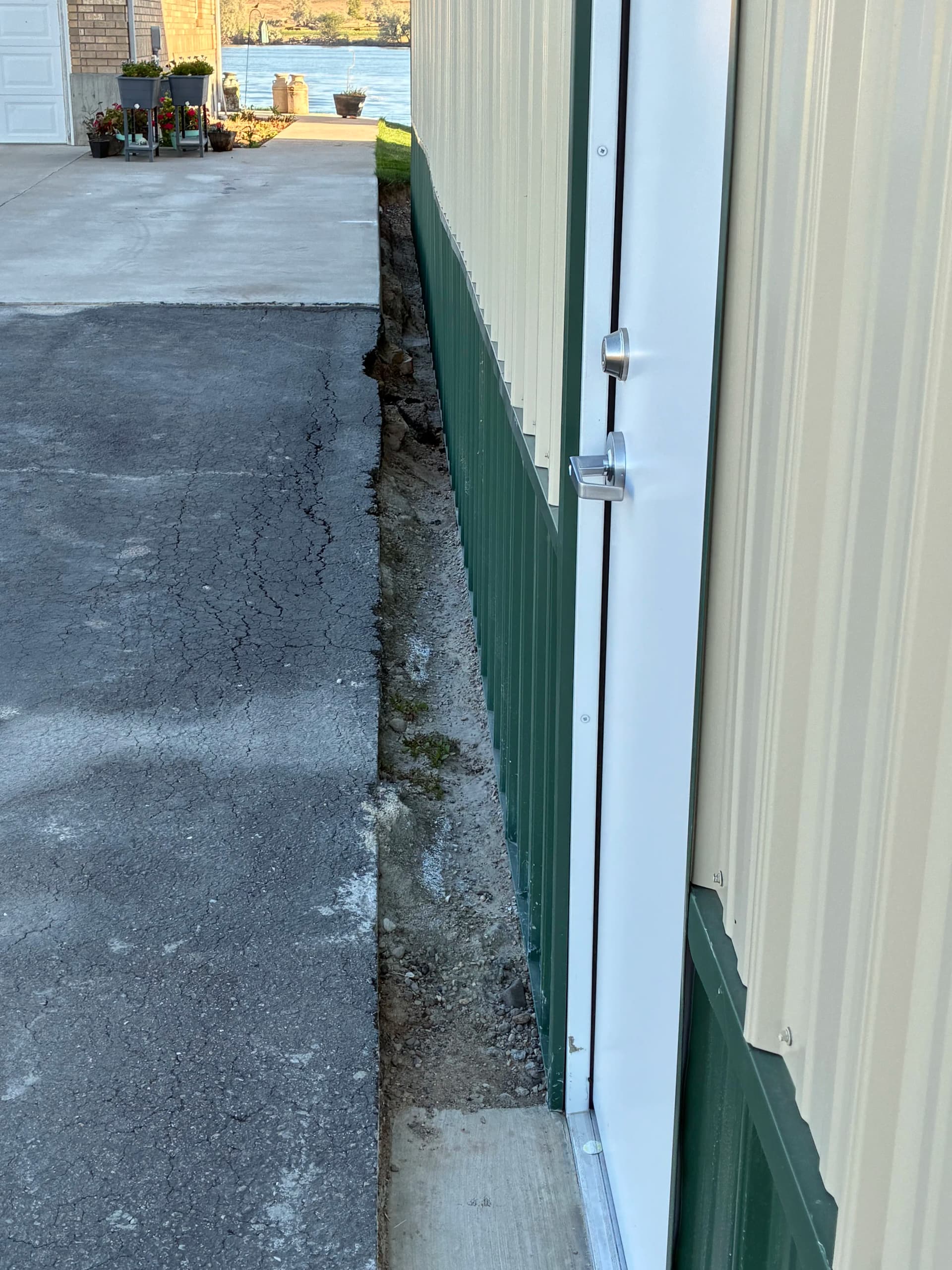 6-Inch Gutters and Snow Guards Installed on Large Pole Building
