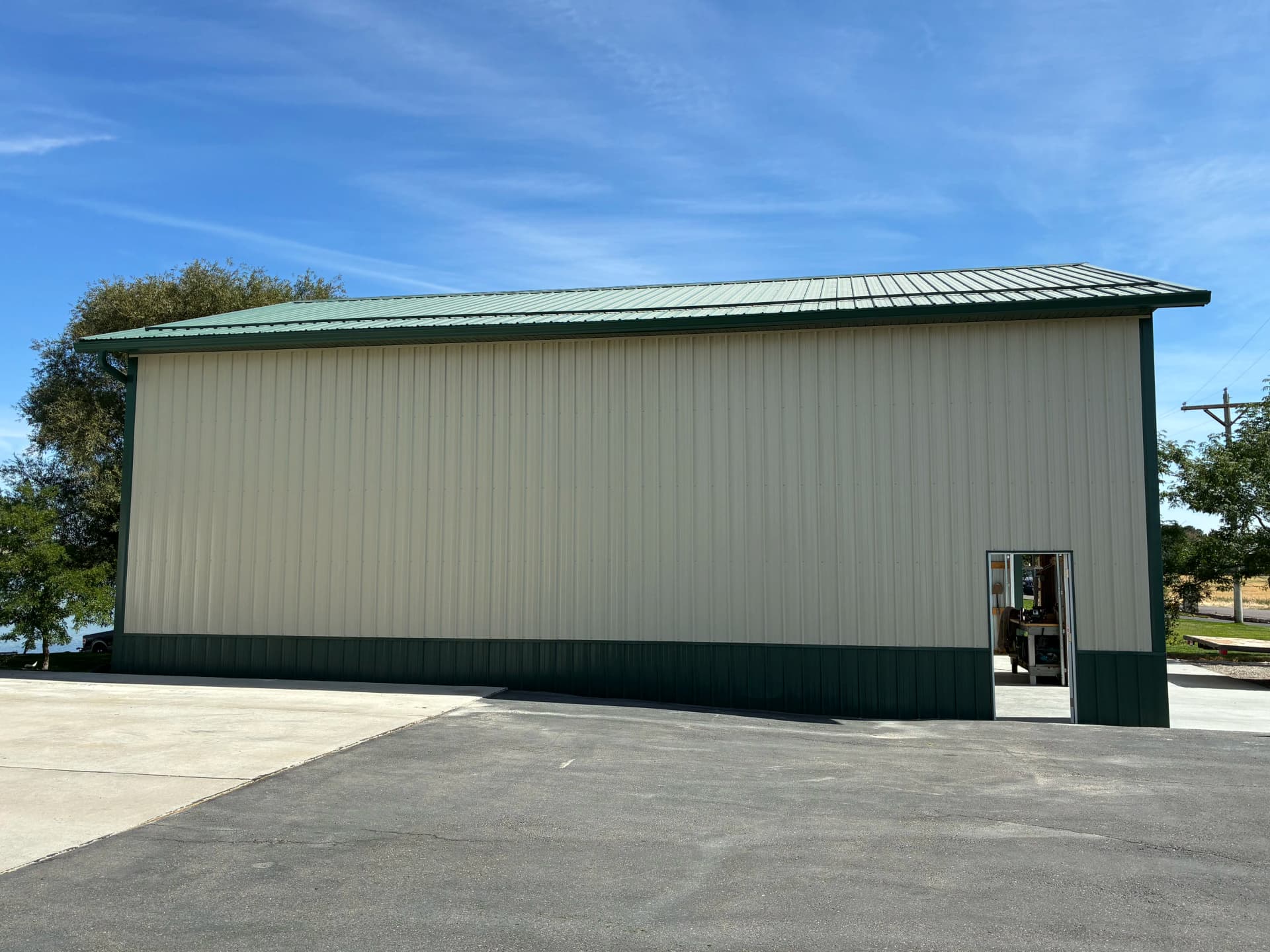 6-Inch Gutters and Snow Guards Installed on Large Pole Building