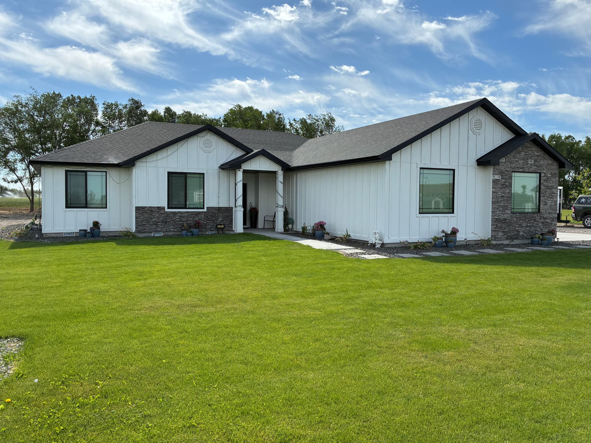 Black Aluminum Gutter Install in Burley Looks Sharp and Works Hard image