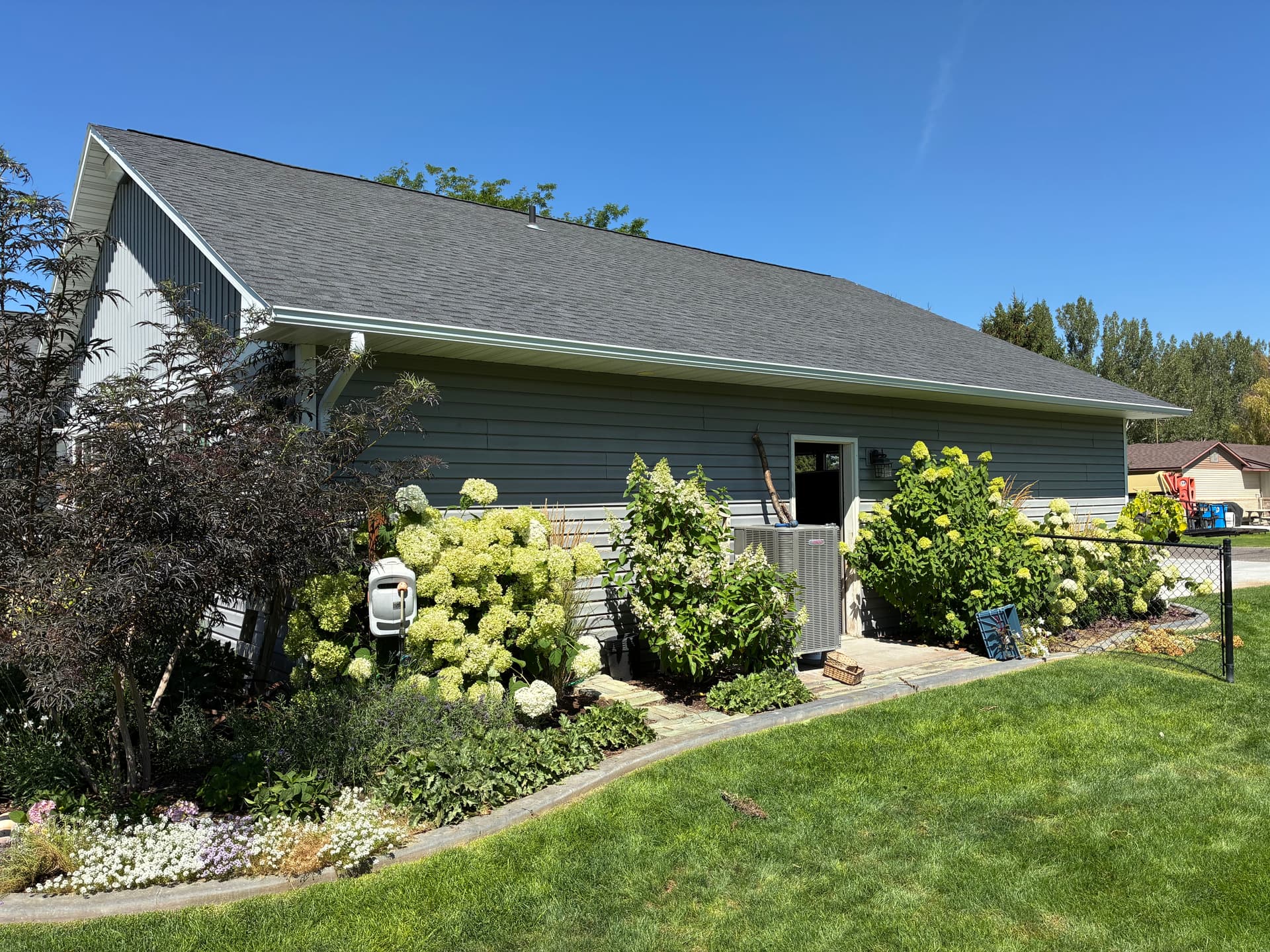 Gallery photos for New Gutters Installed to Protect Beautiful Garden Beds: Image #3
