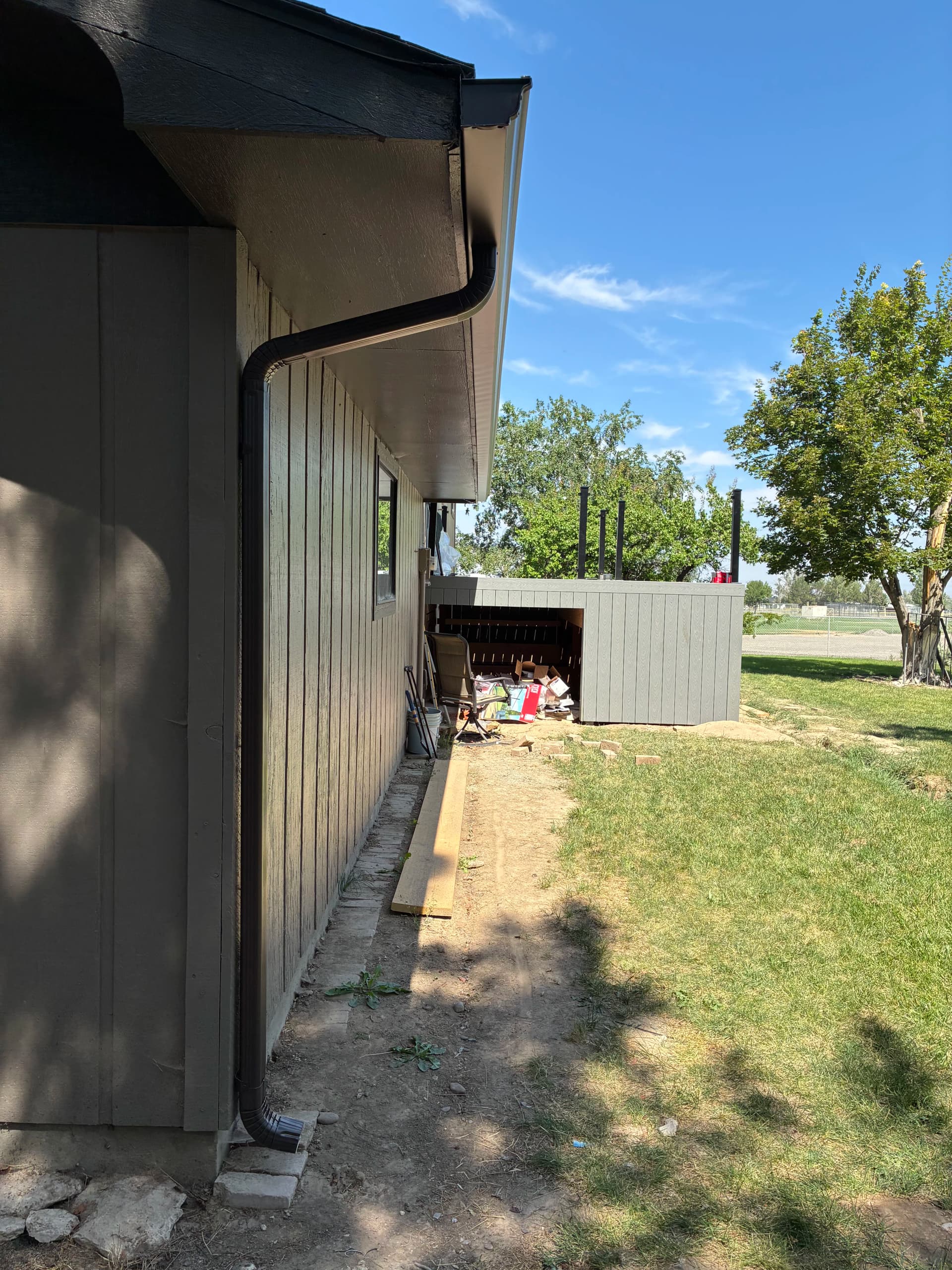 Gallery photos for New Gutters and Downspouts Protect a Fresh Deck and Front Entry: Image #1