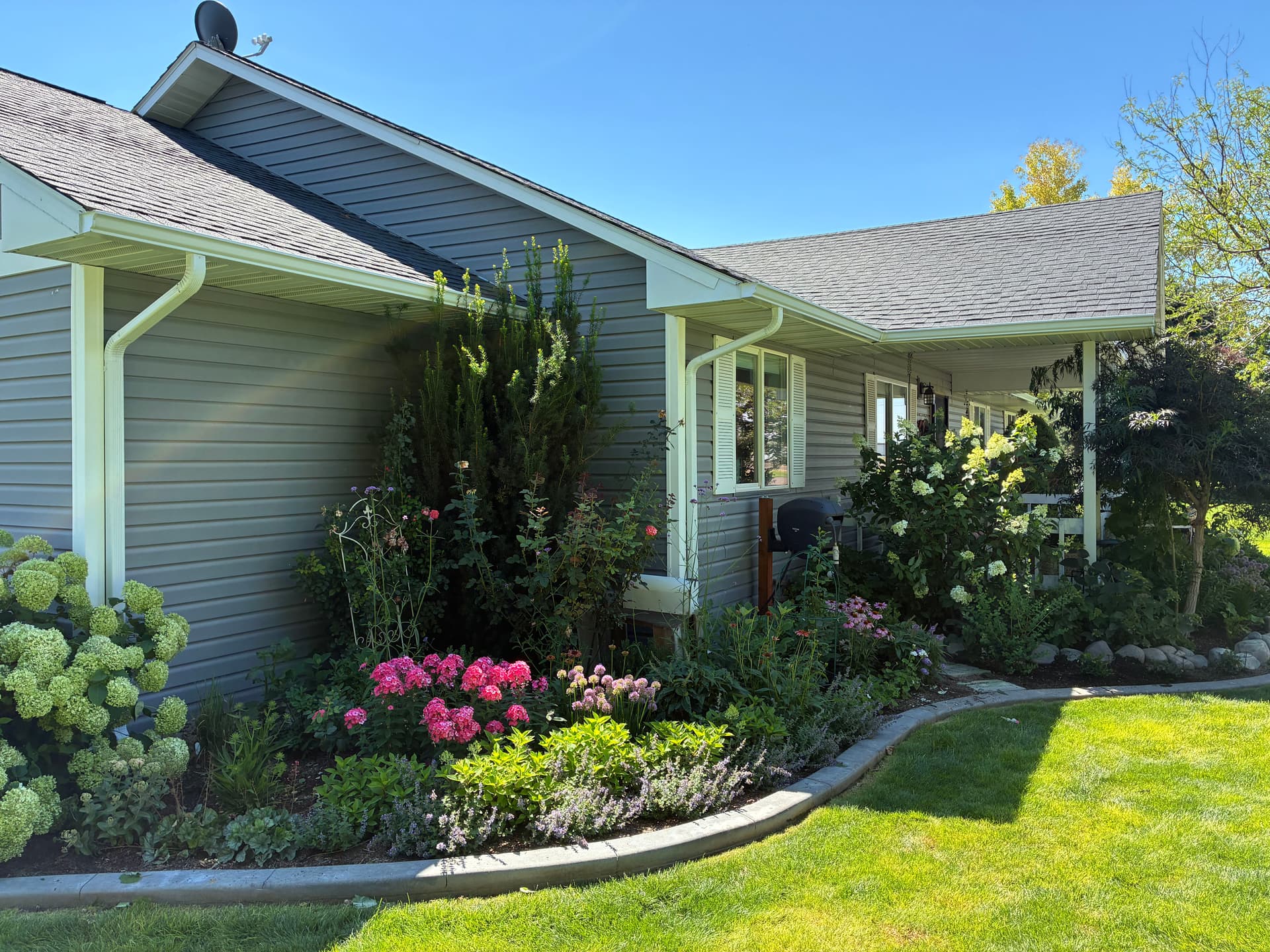 Gallery photos for New Gutters Installed to Protect Beautiful Garden Beds: Image #1
